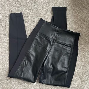 Never worn Athleta leggings with leather detail. Size extra small